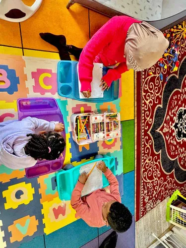 Educational wall displays at Suad Home Daycare